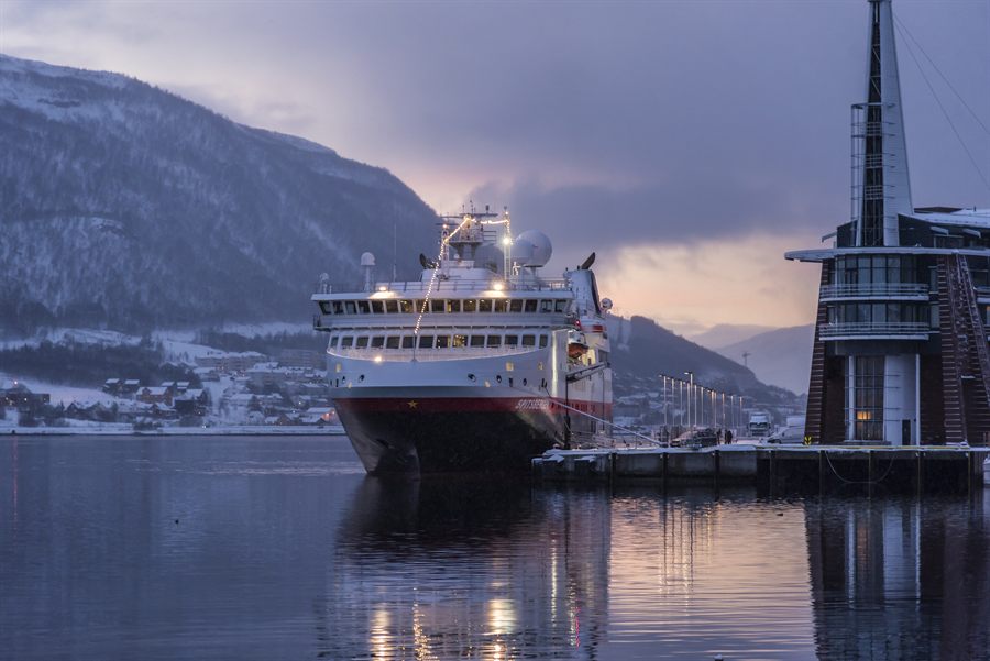 Coastal ship at a pier at dusk