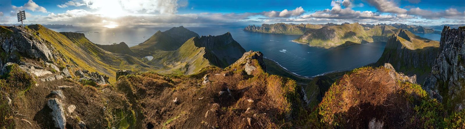 Panorama of untouched mountains and fjords along an Arctic coast